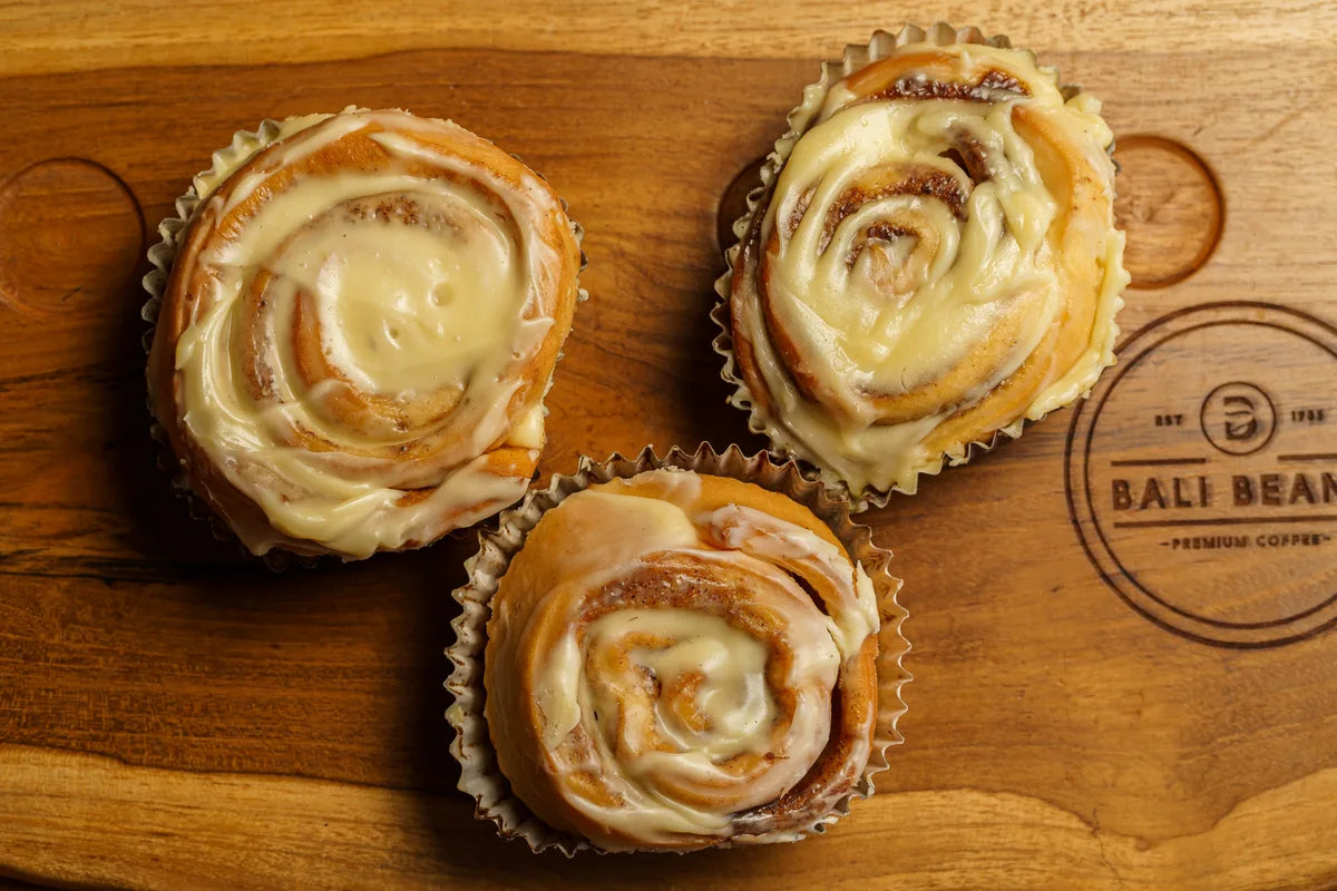 Iced spiral pastries, ready to enjoy with your coffee.