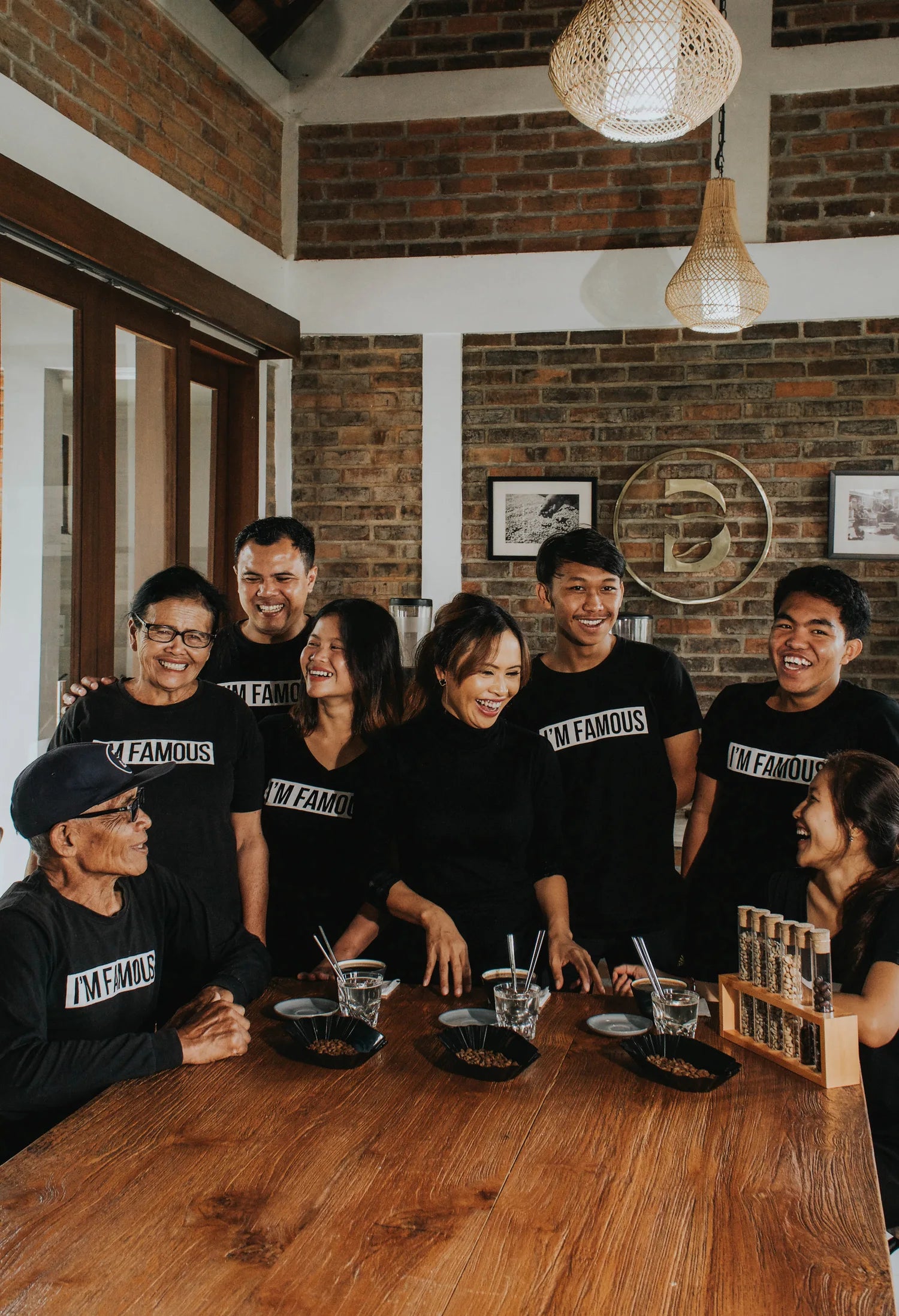 The Bali Beans group gathered around a coffee tasting table